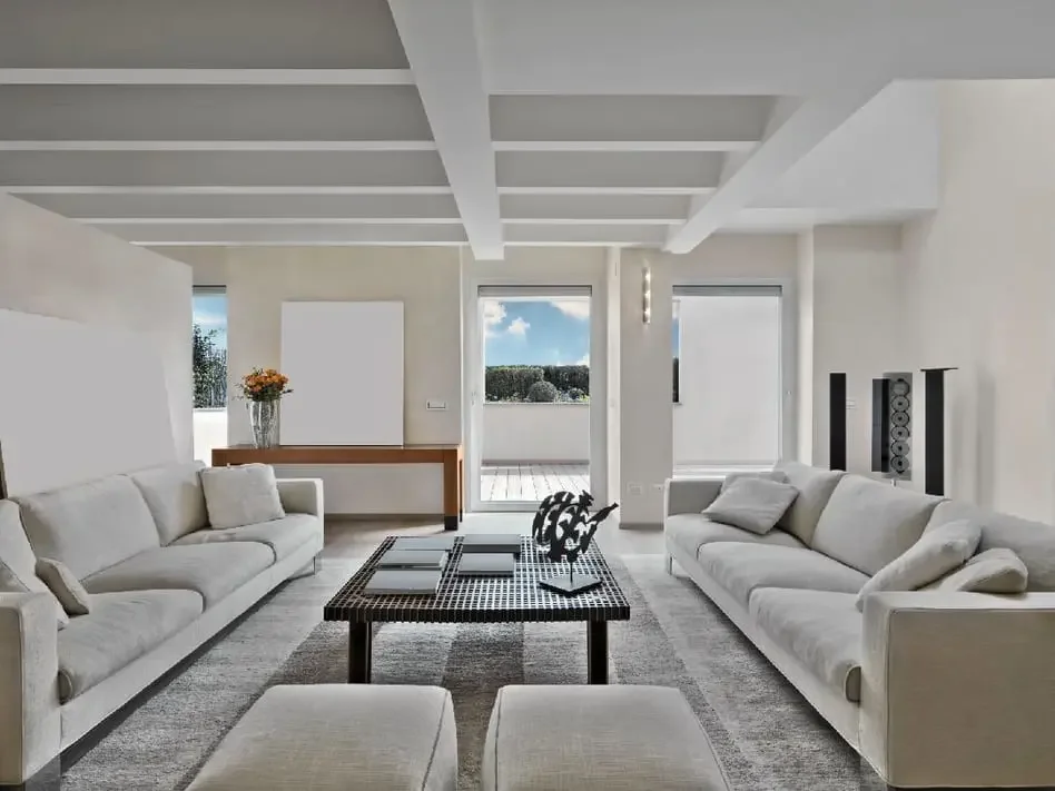 A living room in Austin with white couches and a coffee table.